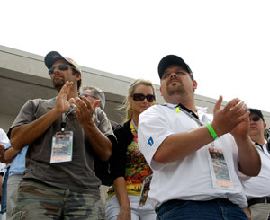 EPIC members applaud at the start of the 92nd Indy 500