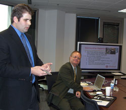 Aaron Gilbertie and Chuck Making a Presentation
